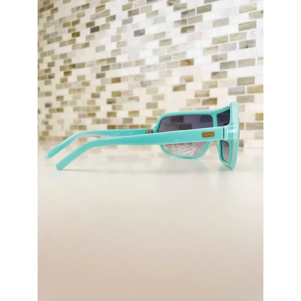 Stussy Mint Green Shield Sunglasses with Gradient Smoke Lenses